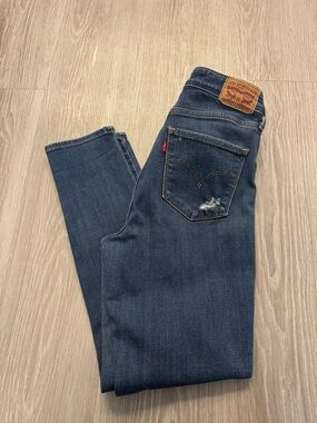 Levi's Distressed Medium Blue Women's Jeans